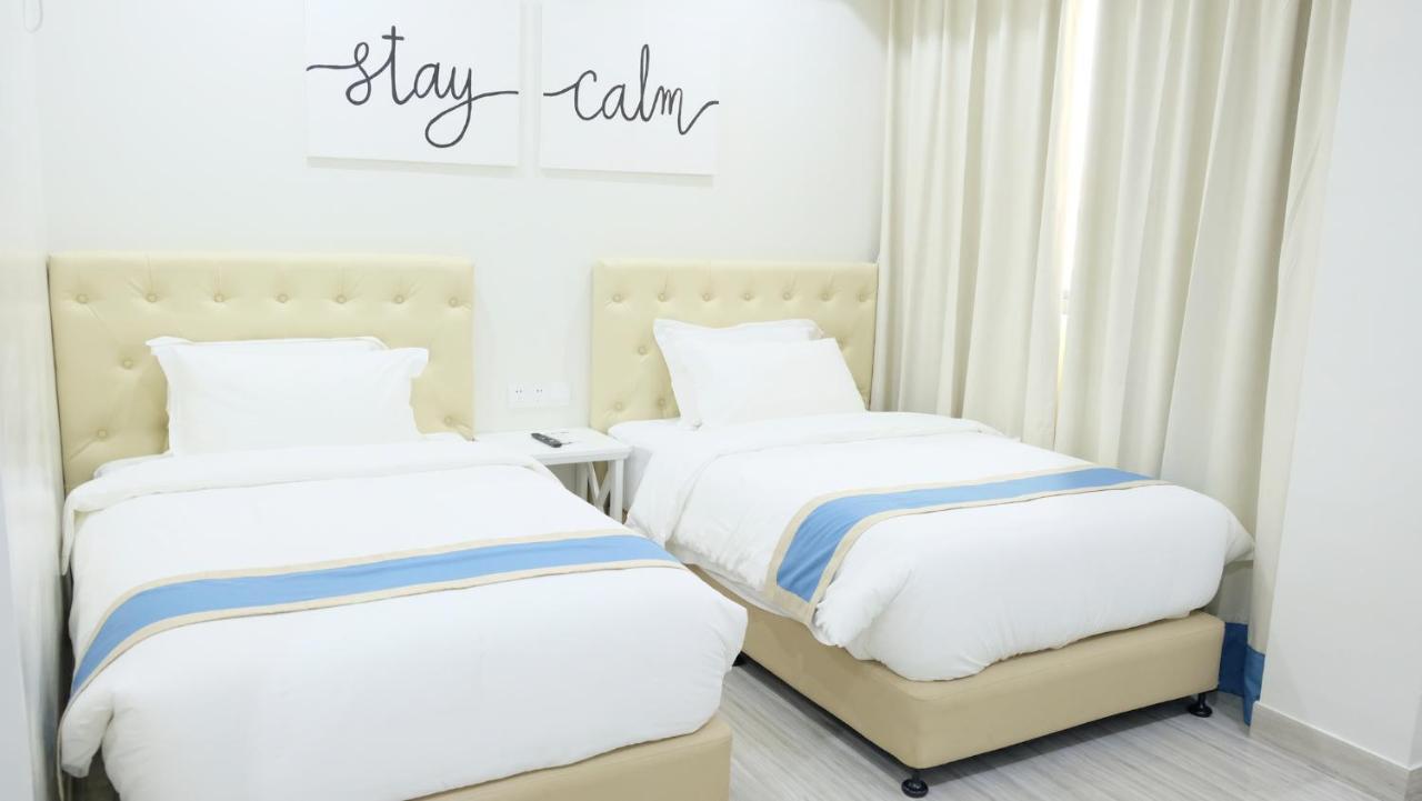 แฮมป์ตัน สวีท Hotel Davao ภายนอก รูปภาพ